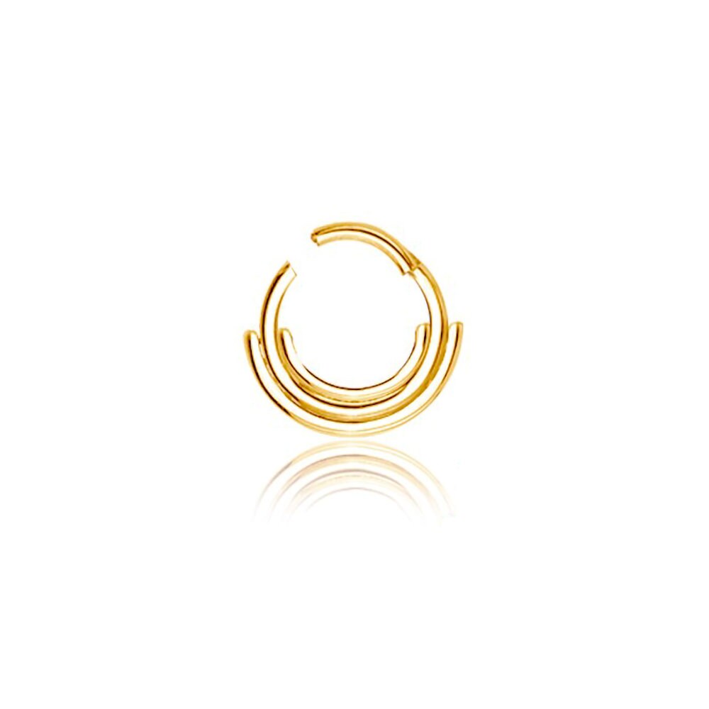 A single Lira Minimalist Boho Chic Septum by Kaya Movement, featuring three concentric crescent-shaped loops, is shown against a white background. Crafted from 316L steel with a luxurious Gold PVD finish, the polished earring casts a subtle reflection on the surface below.